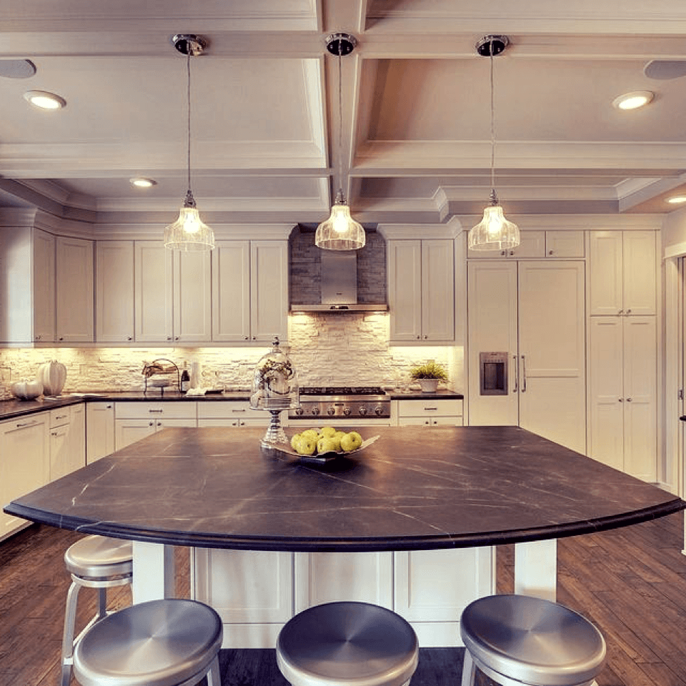 Modern, chic kitchen with painted ceiling, walls, and a granite countertop